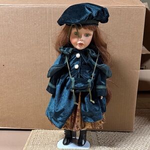 Elegant Doll in Teal Dress and Hat